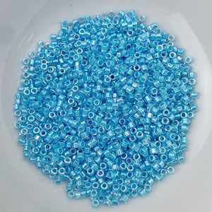11/0 Delica - Aqua Lined Crystal AB DB0057 - The Bead N Crystal & Enclave Gems