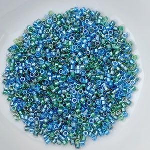11/0 Delica - Spkl Lined Caribbean Mix (blue green) DB0985 - The Bead N Crystal & Enclave Gems