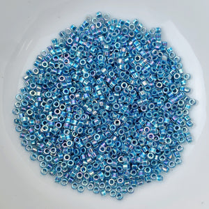 11/0 Delica - Marine Blue Lined Crystal AB DB0058 - The Bead N Crystal & Enclave Gems