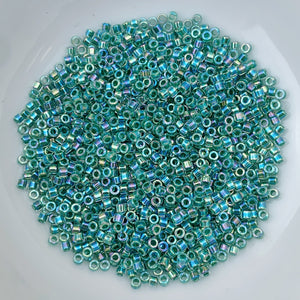 11/0 Delica - Lime Lined Crystal AB DB0060 - The Bead N Crystal & Enclave Gems