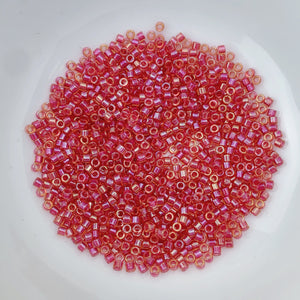 11/0 Delica - Light Cranberry Lined Topaz DB0062 - The Bead N Crystal & Enclave Gems
