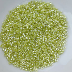 11/0 Delica - Spkl Yellow Green Lined Crystal DB0910 - The Bead N Crystal & Enclave Gems